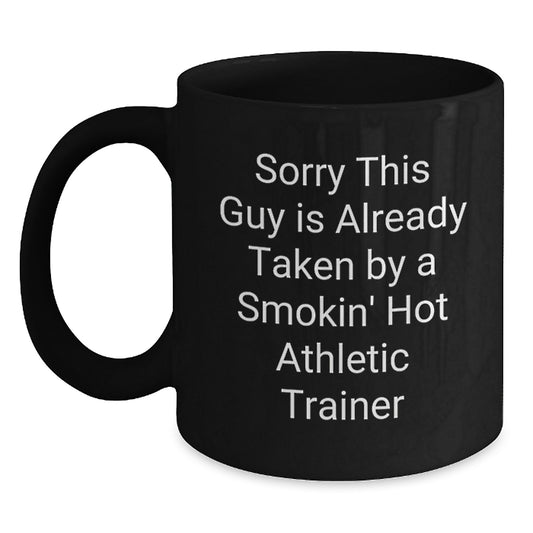 Funny Athletic Trainer Gifts for Birthday, Black Coffee Mug with 'Sorry This Guy Is Already Taken By A Smokin' Hot Athletic Trainer' Quote, Gifts from Friends, Family, or Coworkers - Main