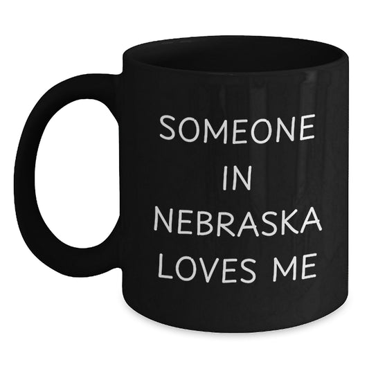 Funny Someone In Nebraska Loves Me Black Coffee Mug Gifts from Friends or Family for Nebraska Birthday - Main