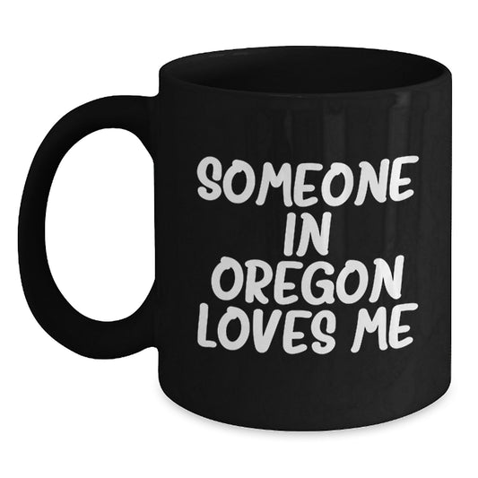 Funny Gifts from Oregon, 'Someone In Oregon Loves Me' Black Coffee Mug for Birthday, Unique Oregon Gifts for Men, Women, Friends, Coworkers, Family - Main