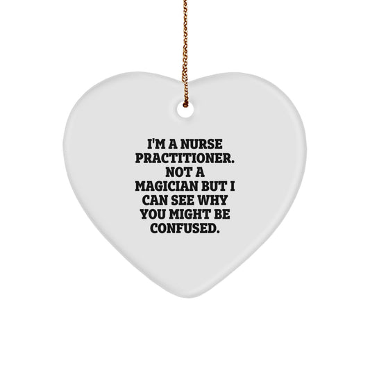 Nurse Practitioner Gifts from Friends and Family, 'I'm A Nurse Practitioner. Not A Magician...' Heart Ornament, Christmas Unique Present for Nurse Practitioners - Image 1