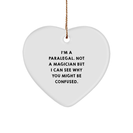 Paralegal Humor Gift from Friends to Colleagues for Christmas - I'm A Paralegal. Not A Magician But I Can See Why You Might Be Confused. Heart Ornament - Image 1