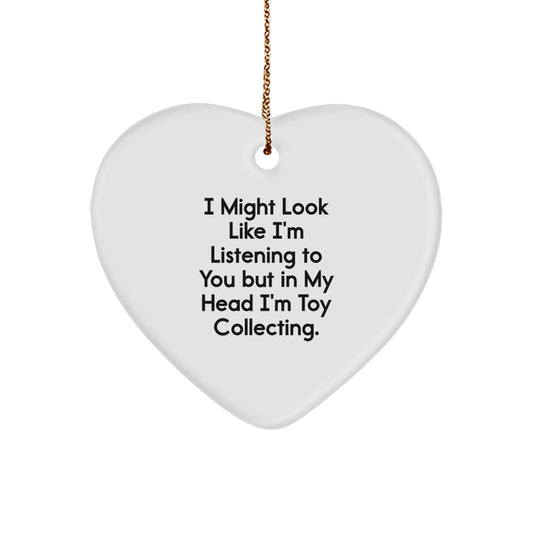 Funny Toy Collecting Gifts from Friends to Family - 'I Might Look Like I'm Listening...' Heart Ornament for Christmas - Image 1