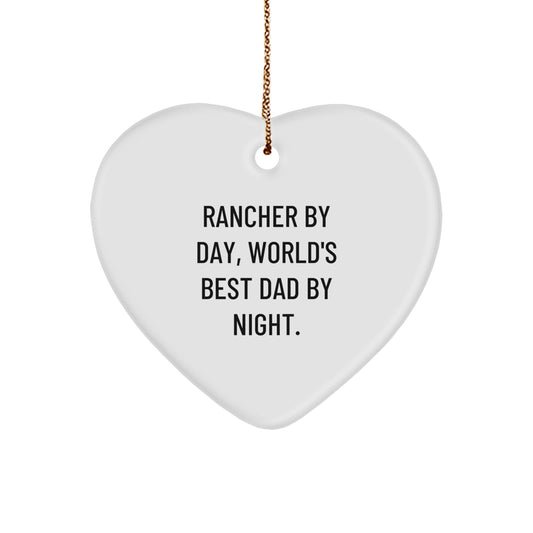 Rancher Gifts by Day, Heartfelt Ornaments by Night, Funny Christmas Decorations for Men, 'Rancher By Day, World's Best Dad By Night.' - Image 1
