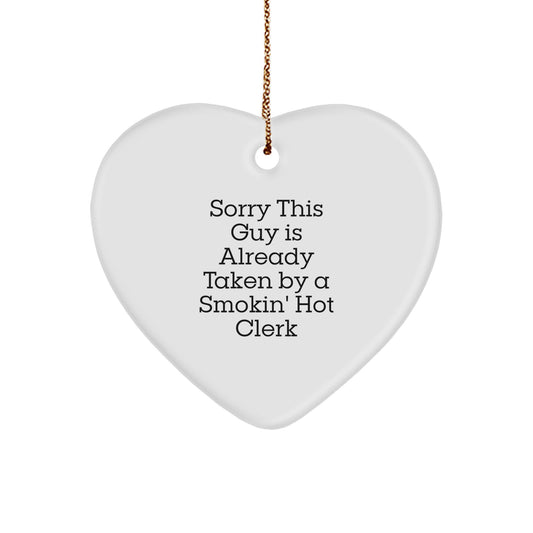 Funny Clerk Gifts: Heart Ornament with 'Sorry This Guy Is Already Taken By A Smokin' Hot Clerk' Quote, Perfect for Christmas - Image 1