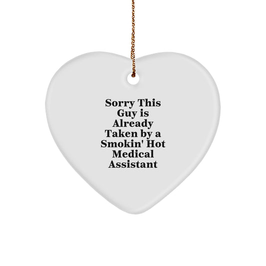 Funny Medical Assistant Gifts - Sorry This Guy Is Already Taken By A Smokin' Hot Medical Assistant Heart Ornament for Christmas - Image 1