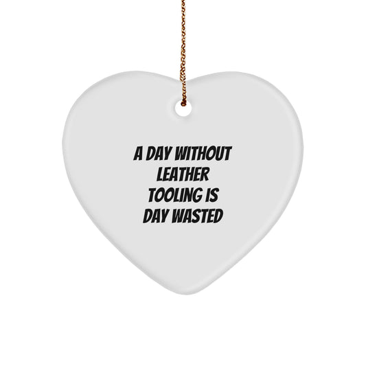 'A Day Without Leather Tooling Is Day Wasted' Funny Leather Tooling Gifts for Friends, Coworkers, Family - Heart Ornament for Christmas - Image 1