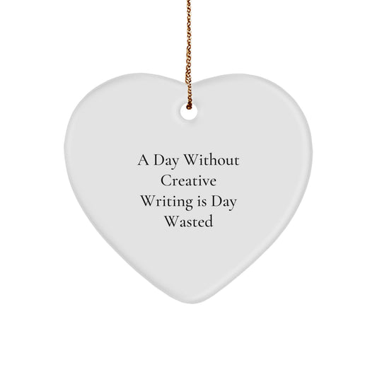 Creative Writing Gifts from Friends to Family - Heart Ornament with 'A Day Without Creative Writing Is Day Wasted' Quote for Christmas - Image 1