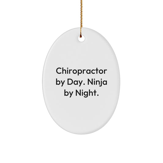 Chiropractor Gifts for Christmas - 'Chiropractor By Day. Ninja By Night.' Oval Ornament Gifts from Friends to Family - Image 1