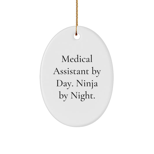 Medical Assistant Gifts, Funny Quote Oval Ornament, 'Medical Assistant By Day. Ninja By Night.' for Christmas, Gifts from Friends, for Medical Assistant - Image 1