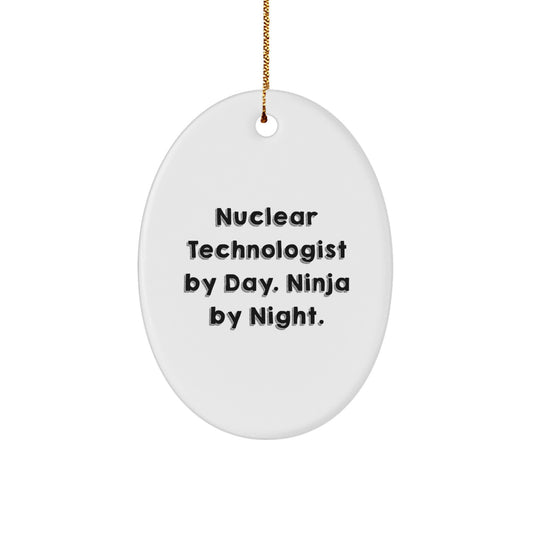 Nuclear Technologist Gifts from Friends for Christmas - Oval Ornament with Funny Quote 'Nuclear Technologist By Day. Ninja By Night.' - Image 1