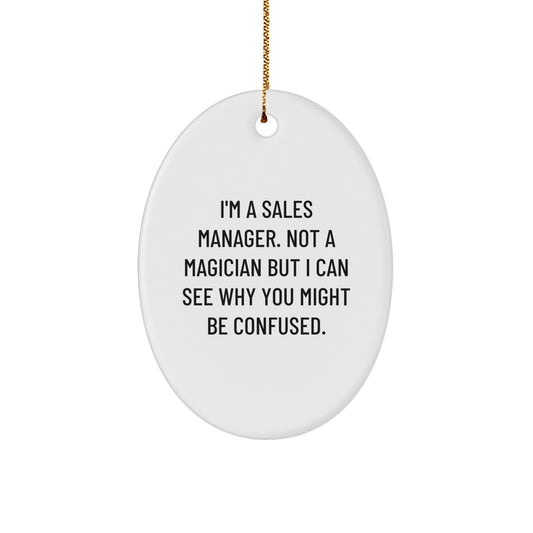 Gifts from Friends for Sales Manager - 'I'm A Sales Manager. Not A Magician...' Oval Ornament, Funny Quote, Christmas - Image 1