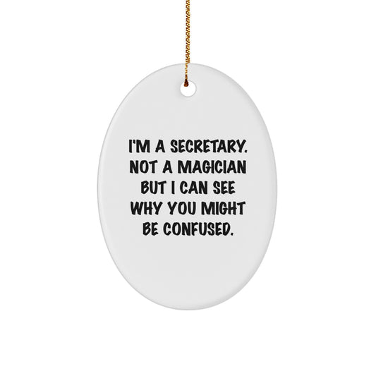 Funny Secretary Gifts from Friends to Family - Oval Ornament with 'I'm A Secretary. Not A Magician But I Can See Why You Might Be Confused.' Quote for Christmas - Image 1