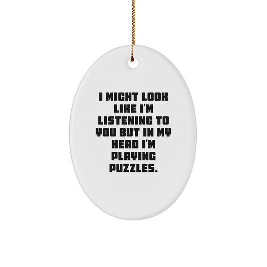 Funny Puzzle Lovers Gifts from Family, Friends, or Coworkers - I Might Look Like I'm Listening To You But In My Head I'm Playing Puzzles Oval Ornament, Puzzles Gifts for Christmas - Image 1