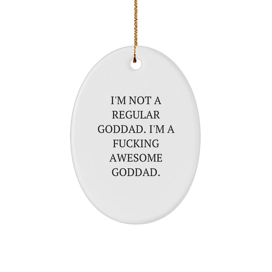 Funny Goddad Gifts, 'I'm Not A Regular Goddad. I'm A F--king Awesome Goddad.' Oval Ornament for Men, White Oval Shape, Gift from Family, Perfect for Goddad's Christmas - Image 1
